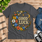 Good Luck In Gold cute celestial graphic t-shirt cozy flat lay in asphalt.