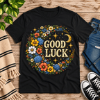 Good Luck In Gold cute celestial graphic t-shirt cozy flat lay in vintage black.
