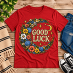 Good Luck In Gold cute celestial graphic t-shirt cozy flat lay in red.