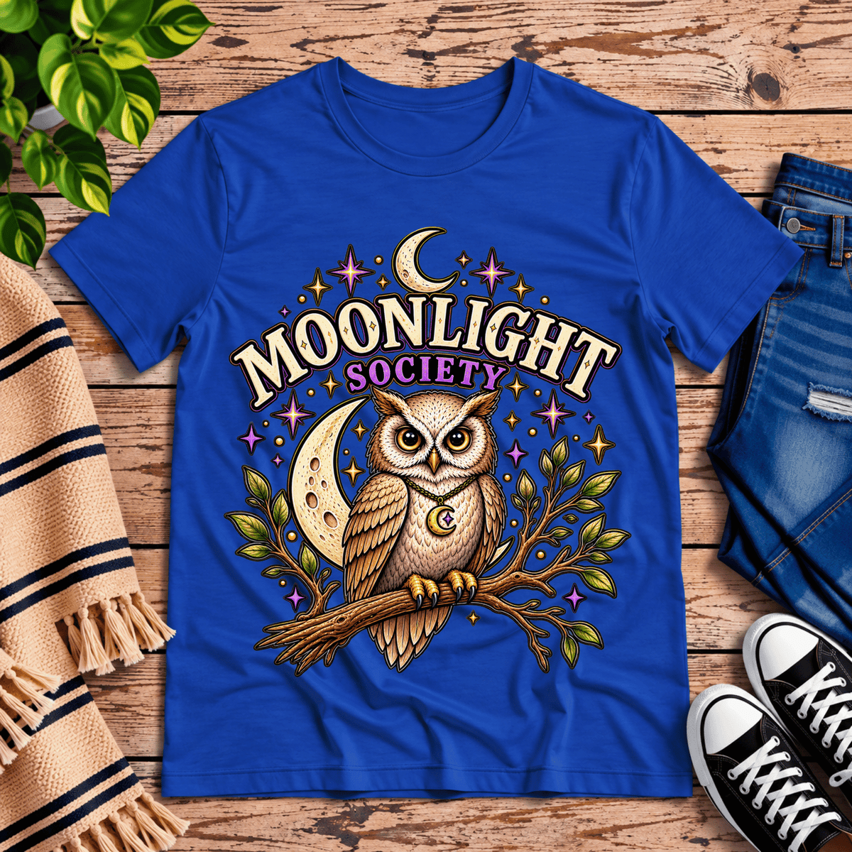 Moonlight Society cute celestial graphic t-shirt cozy flat lay in true royal.