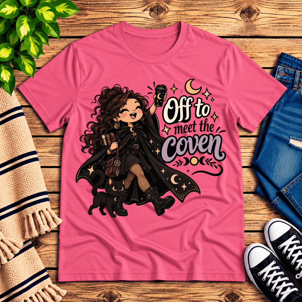 Off to Meet the Coven witchy celestial graphic t-shirt cozy flat lay in charity pink.