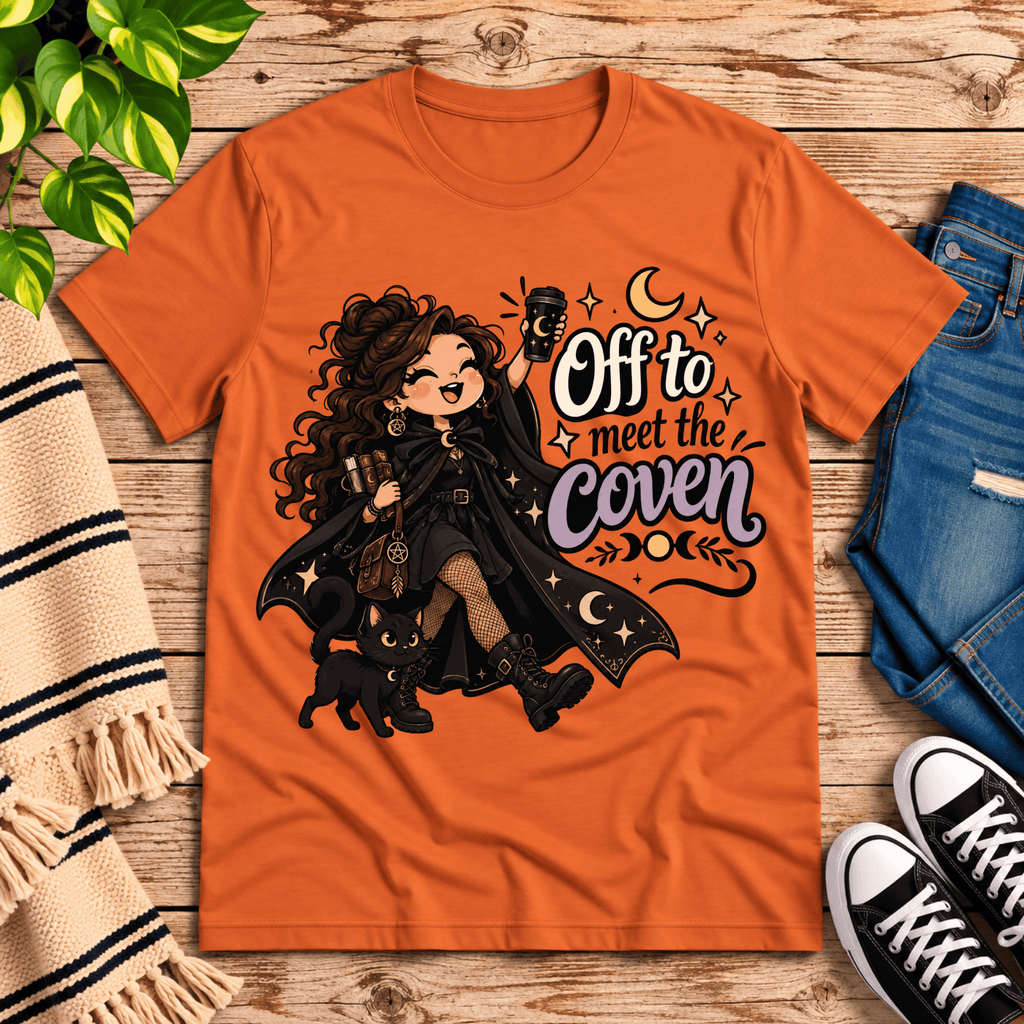 Off to Meet the Coven witchy celestial graphic t-shirt cozy flat lay in burnt orange.