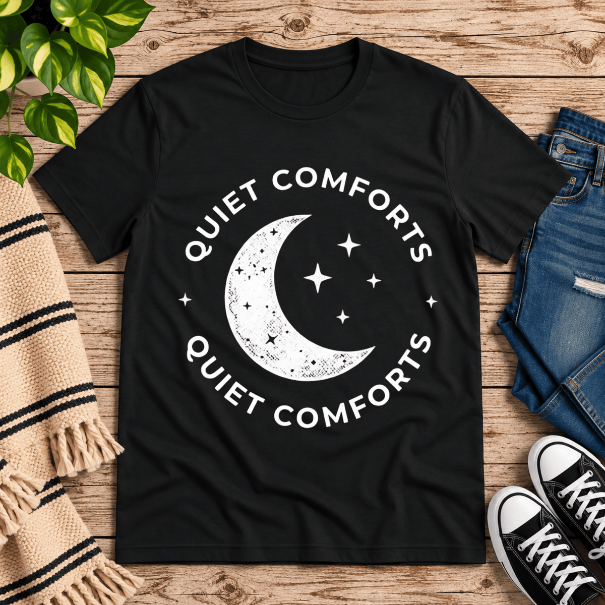 Quiet Comforts celestial graphic t-shirt cozy flat lay in vintage black.