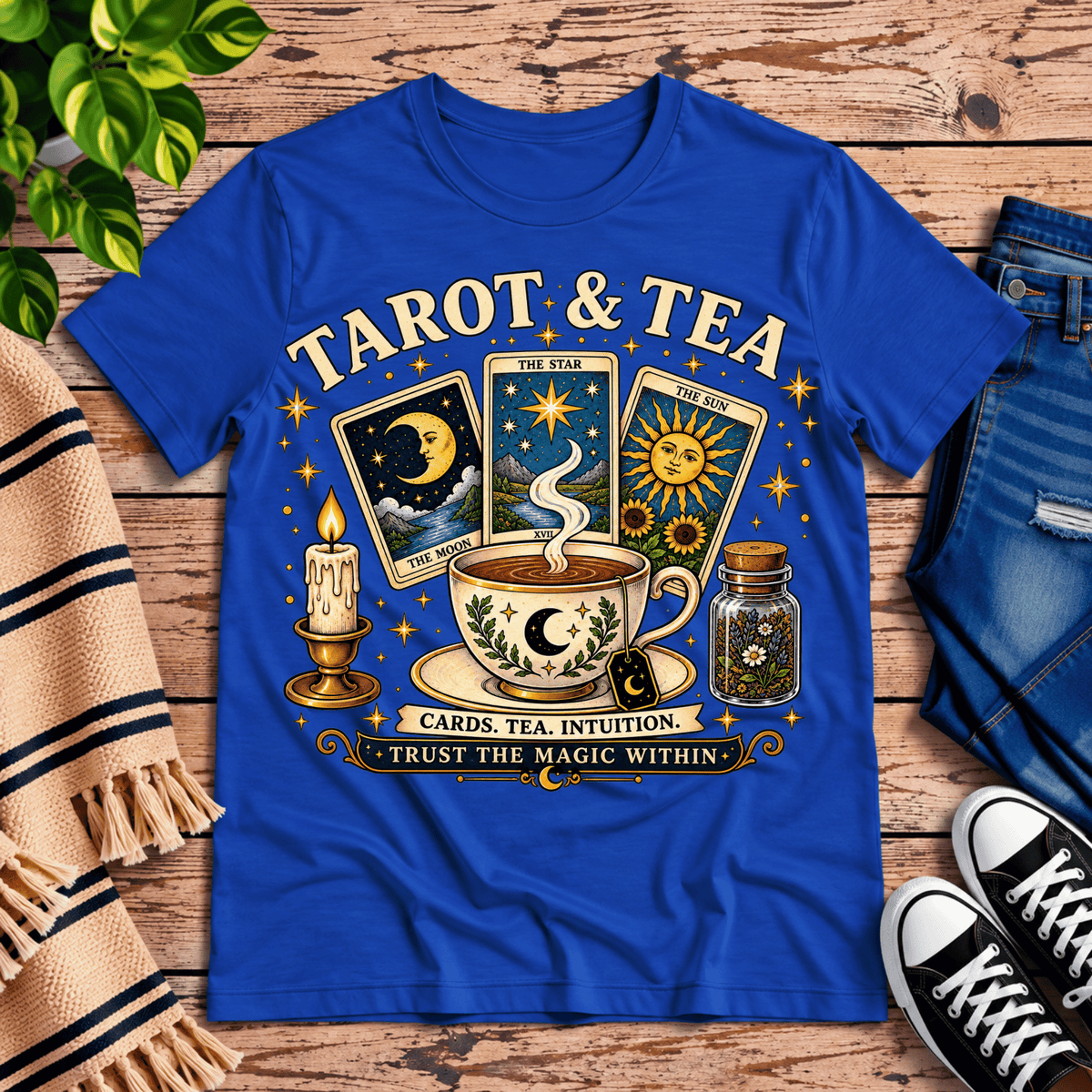 Tarot & Tea tarot card graphic t-shirt cozy flat lay in true royal.