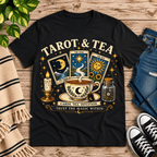 Tarot & Tea tarot card graphic t-shirt cozy flat lay in vintage black.