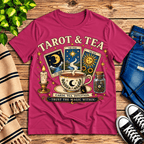 Tarot & Tea tarot card graphic t-shirt cozy flat lay in berry.