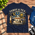 Tarot & Tea tarot card graphic t-shirt cozy flat lay in navy.