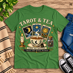 Tarot & Tea tarot card graphic t-shirt cozy flat lay in leaf.