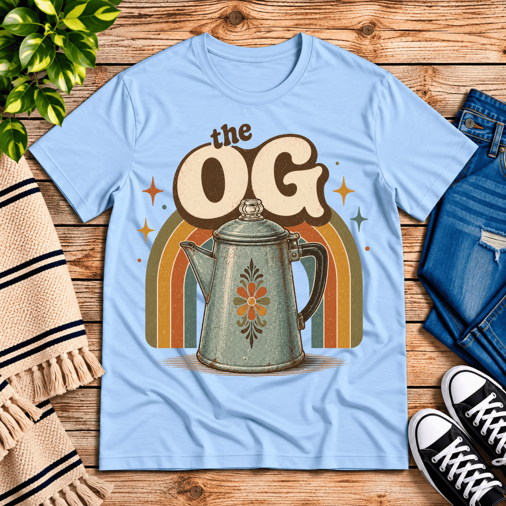 The OG retro coffee graphic t-shirt cozy flat lay in baby blue.