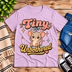 Tiny But Unbothered cute animal graphic t-shirt cozy flat lay in lilac.