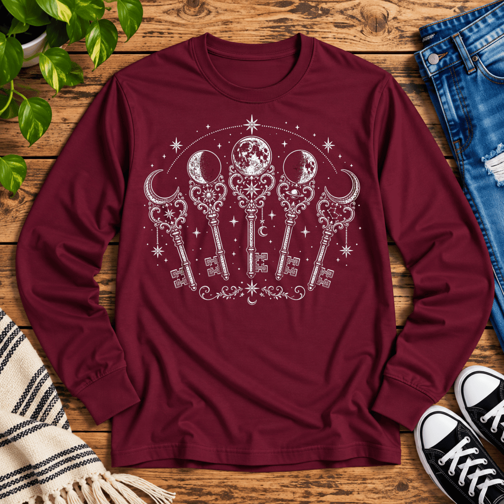 Moon Phase Keys mystical magic graphic long sleeve cozy flat lay in maroon.