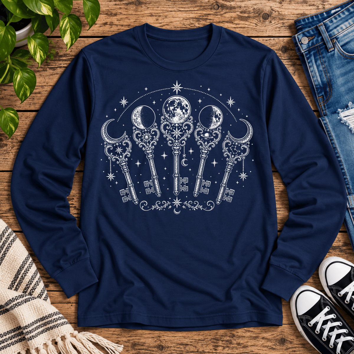 Moon Phase Keys mystical magic graphic long sleeve cozy flat lay in j. navy.