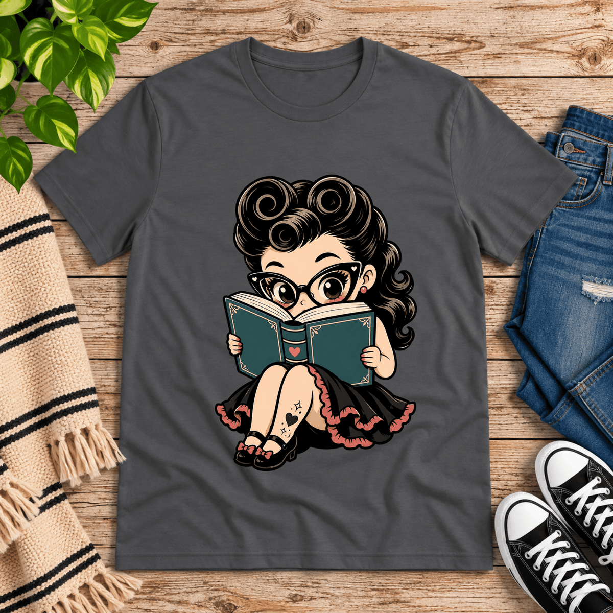 Bookworm Betty pinup graphic t-shirt cozy flat lay in asphalt.