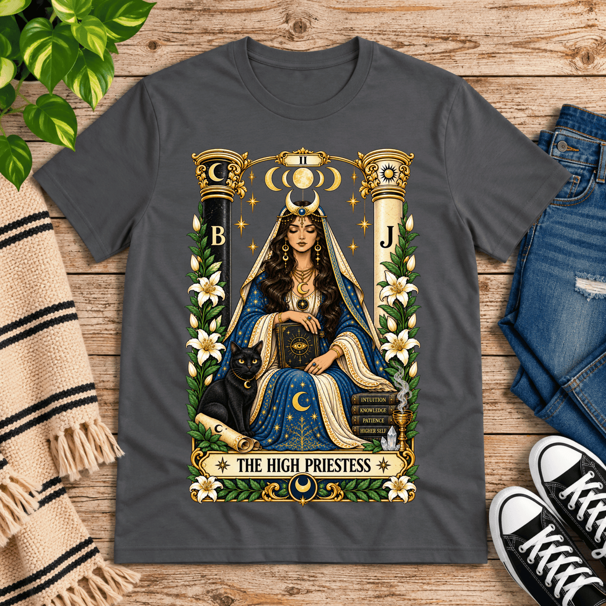 The High Priestess tarot card graphic t-shirt cozy flat lay in asphalt.