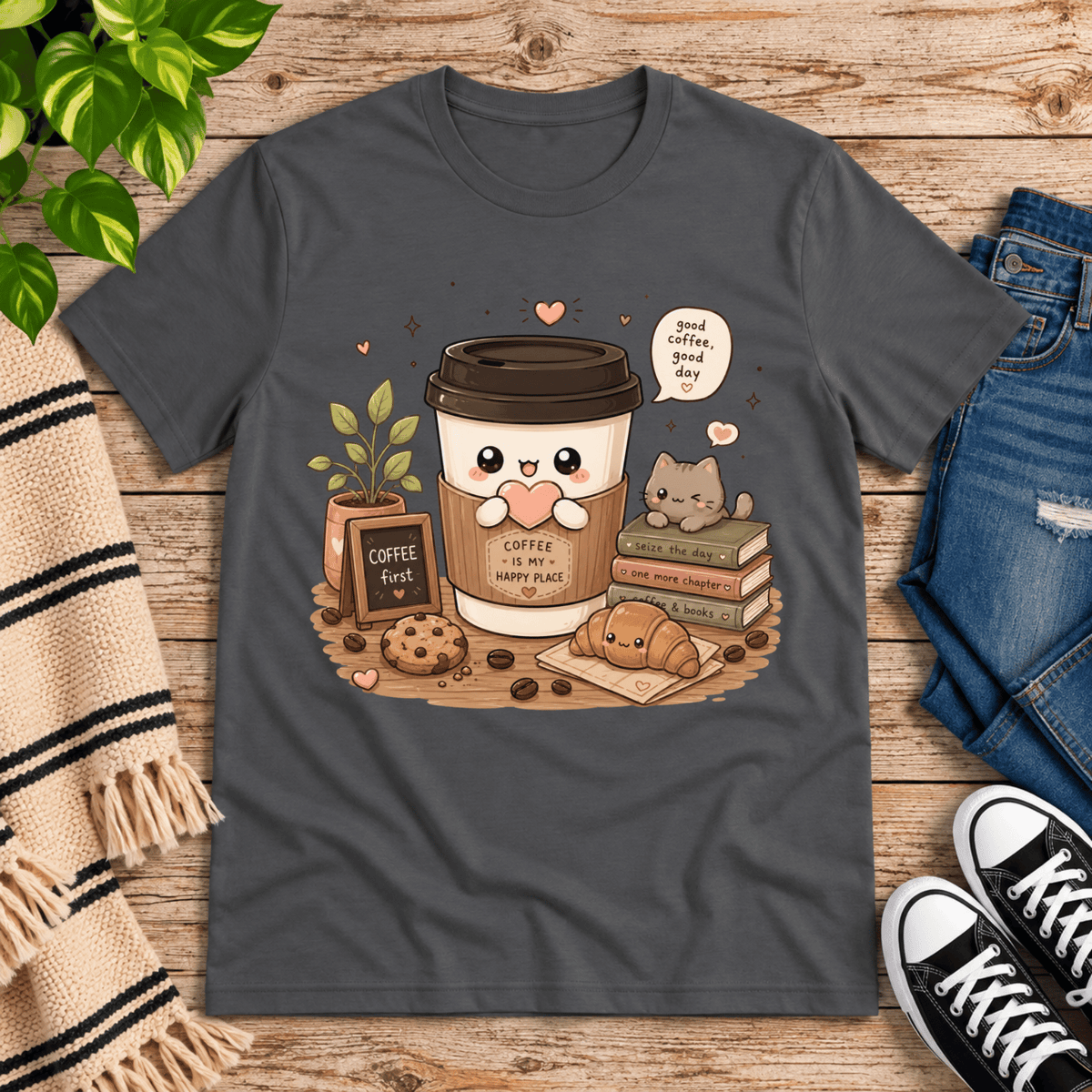 Good Coffee graphic t-shirt cozy flat lay in asphalt.