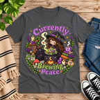 Currently Brewing cute witchy graphic t-shirt cozy flat lay in asphalt.