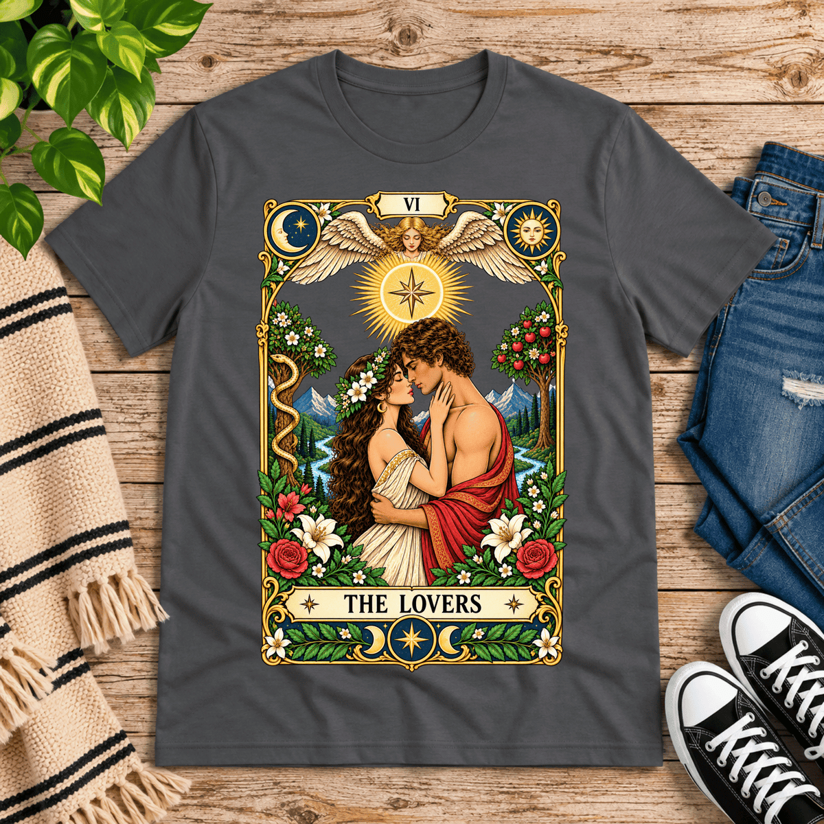 The Lovers tarot card graphic t-shirt cozy flat lay in asphalt.