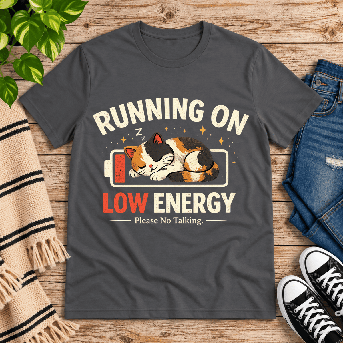 Low Energy Cat cute animal graphic t-shirt cozy flat lay in asphalt.