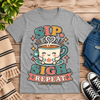 Sip. Sigh. Repeat. coffee graphic t-shirt cozy flat lay in athletic heather.