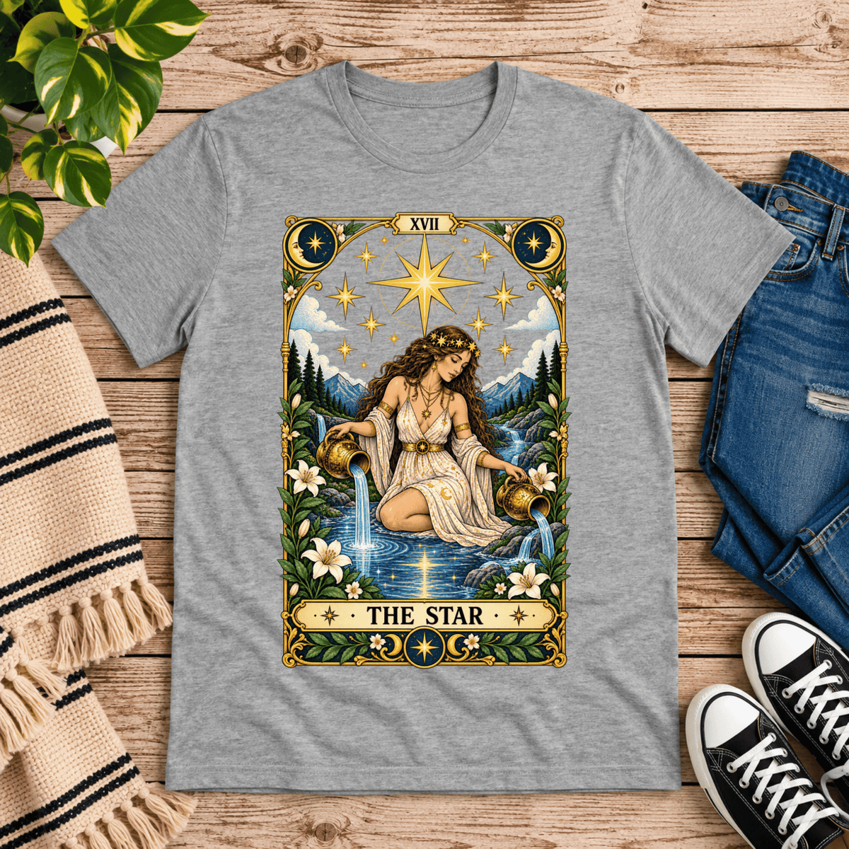 The Star tarot card graphic t-shirt cozy flat lay in athletic heather.