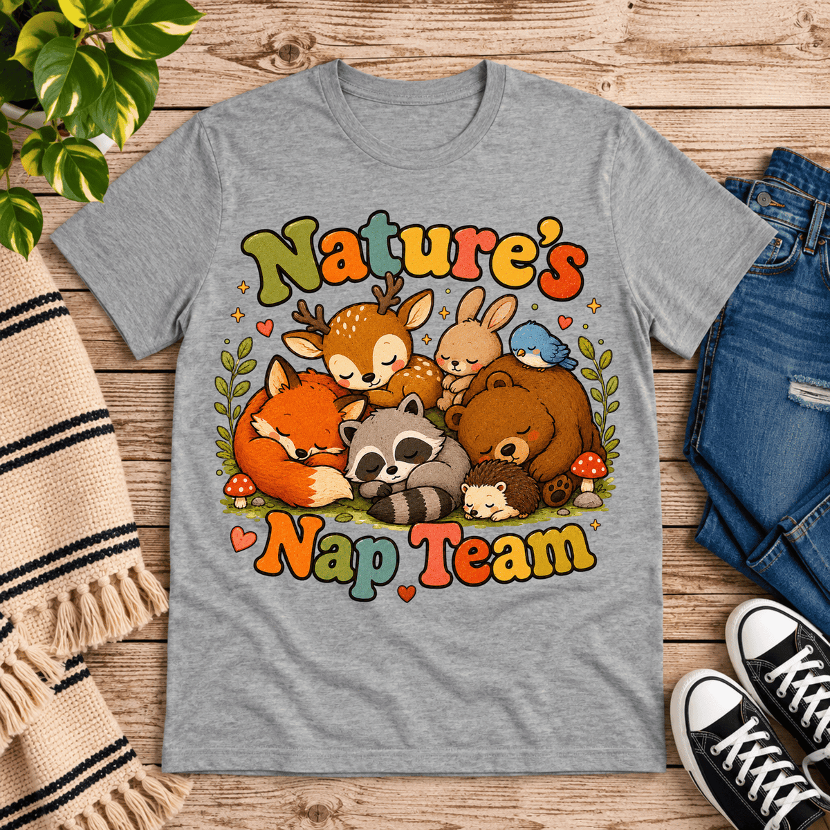 Nature's Nap Team cute animal graphic t-shirt cozy flat lay in athletic heather.