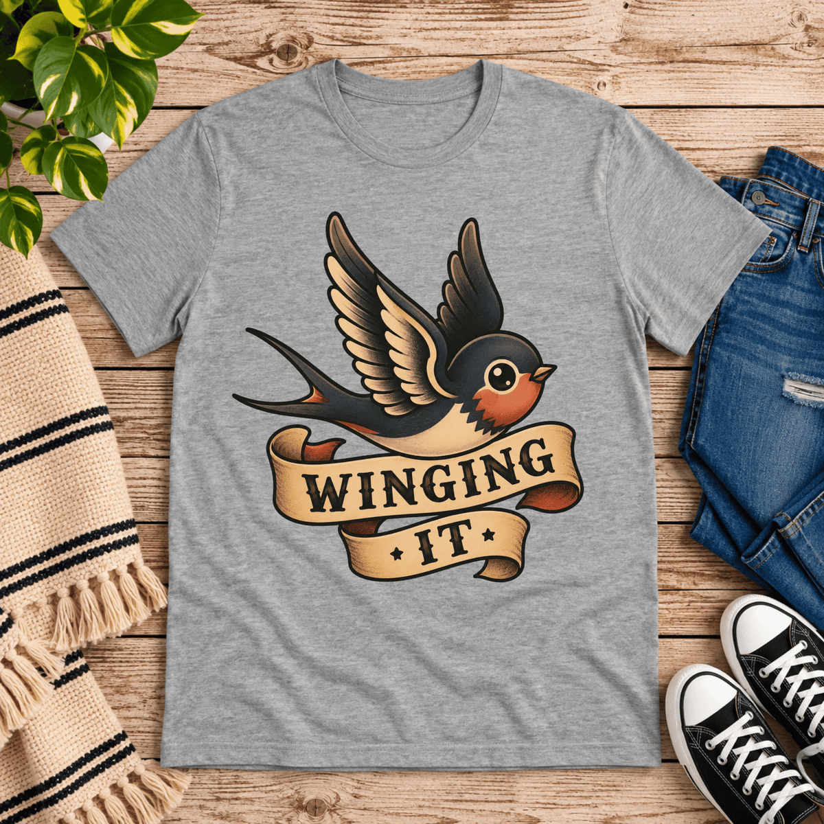 Winging It cute animal graphic t-shirt cozy flat lay in athletic heather.