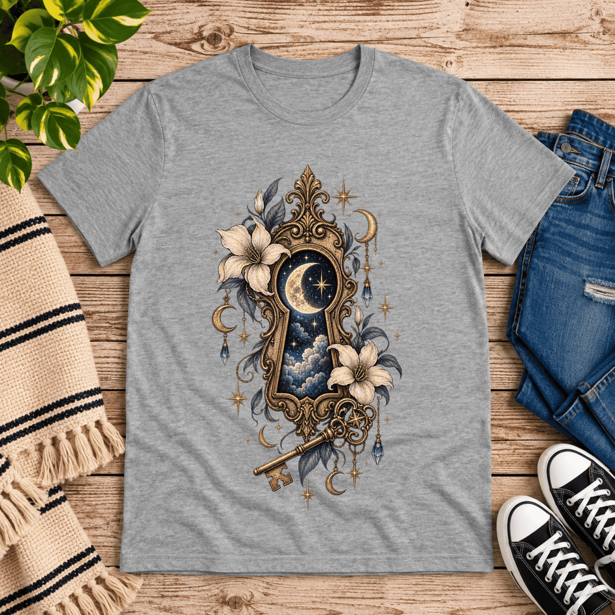 Cosmos Keyhole celestial graphic t-shirt cozy flat lay in athletic heather.