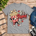 It's Poppin' cute food graphic t-shirt cozy flat lay in athletic heather.