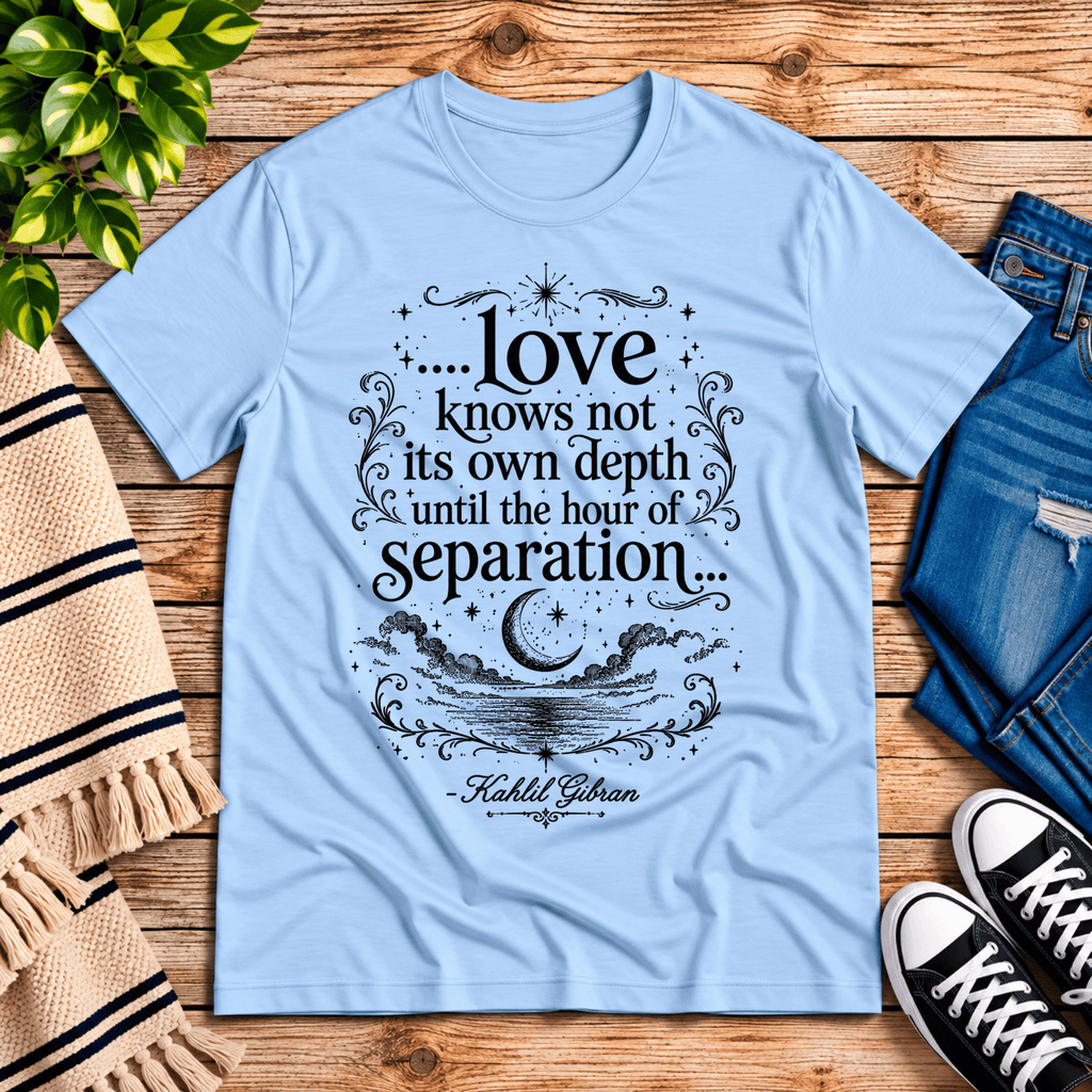 Love Knows Not book quote graphic t-shirt cozy flat lay in baby blue.