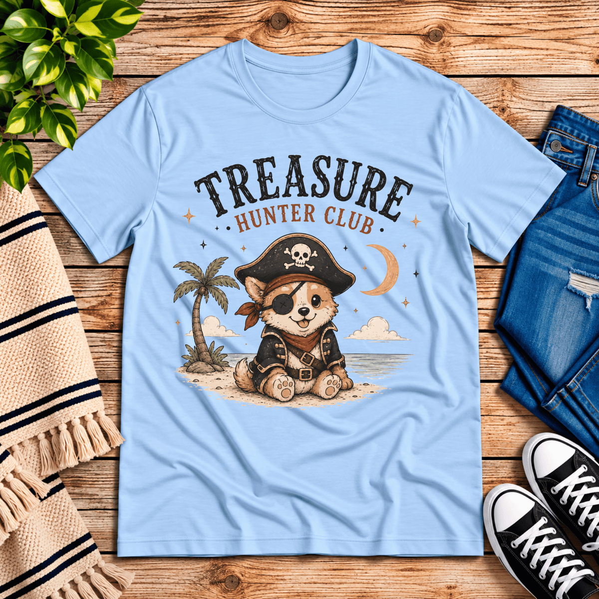 Treasure Hunter Club cute animal graphic t-shirt cozy flat lay in baby blue.