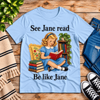 See Jane Read vintage book graphic t-shirt cozy flat lay in baby blue.