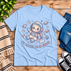 Floating In Space funny introvert graphic t-shirt cozy flat lay in baby blue.