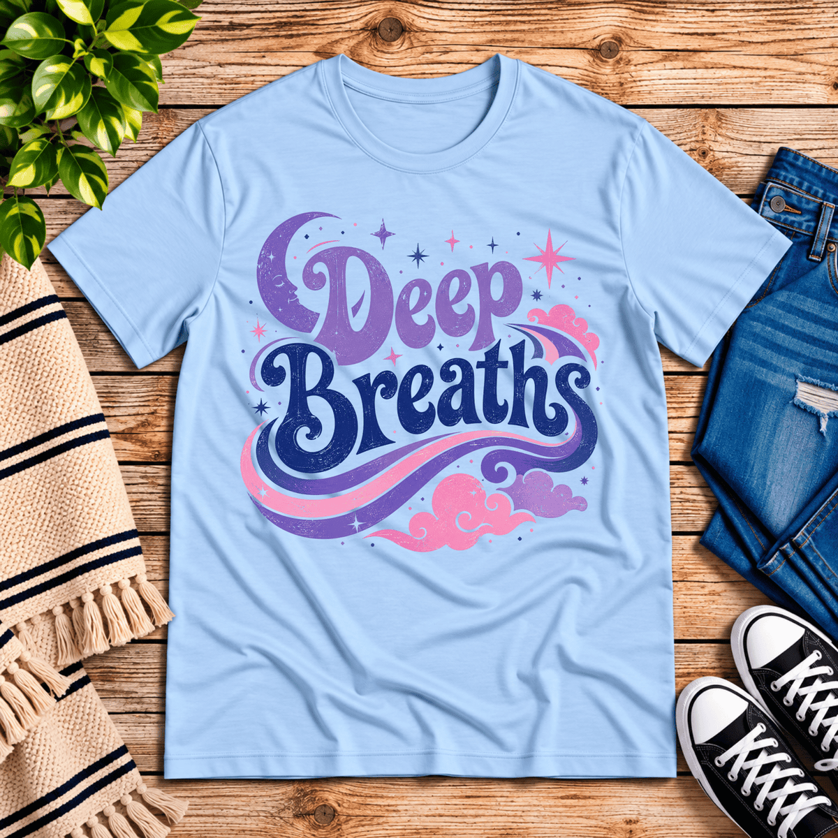 Deep Breaths inspirational introvert graphic t-shirt cozy flat lay in baby blue.