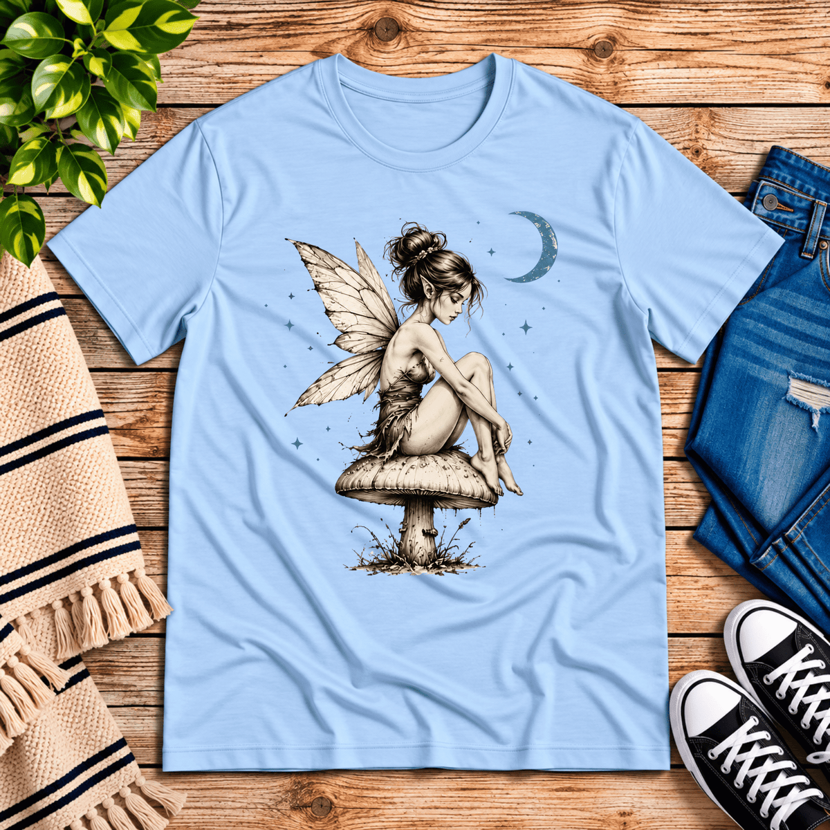 Mushroom Fairy vintage fairy graphic t-shirt cozy flat lay in baby blue.