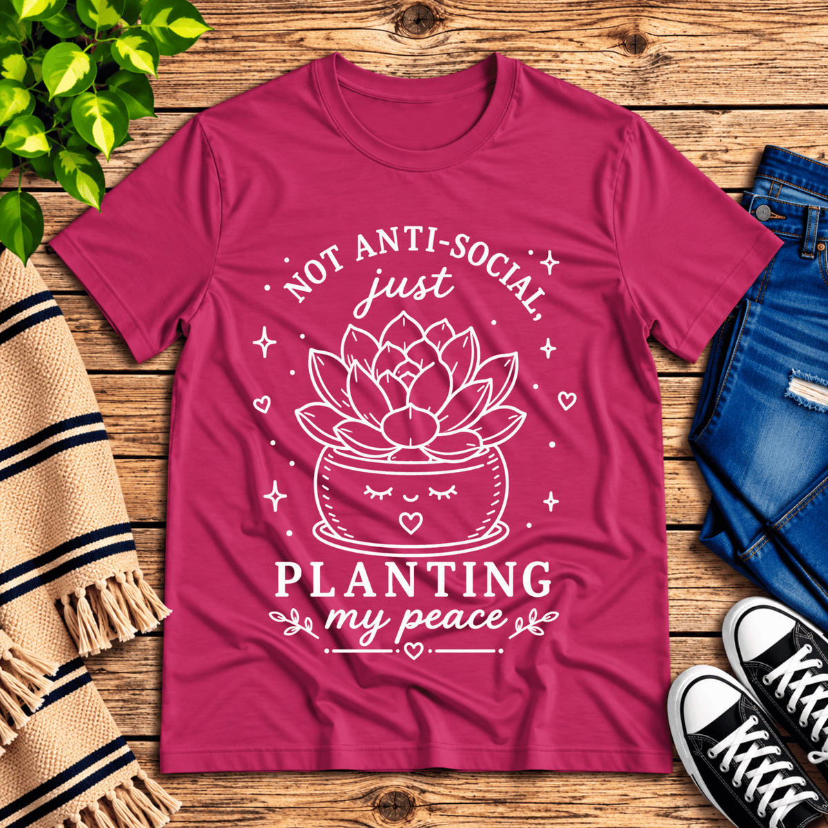 Planting My Peace cute plant graphic t-shirt cozy flat lay in berry.