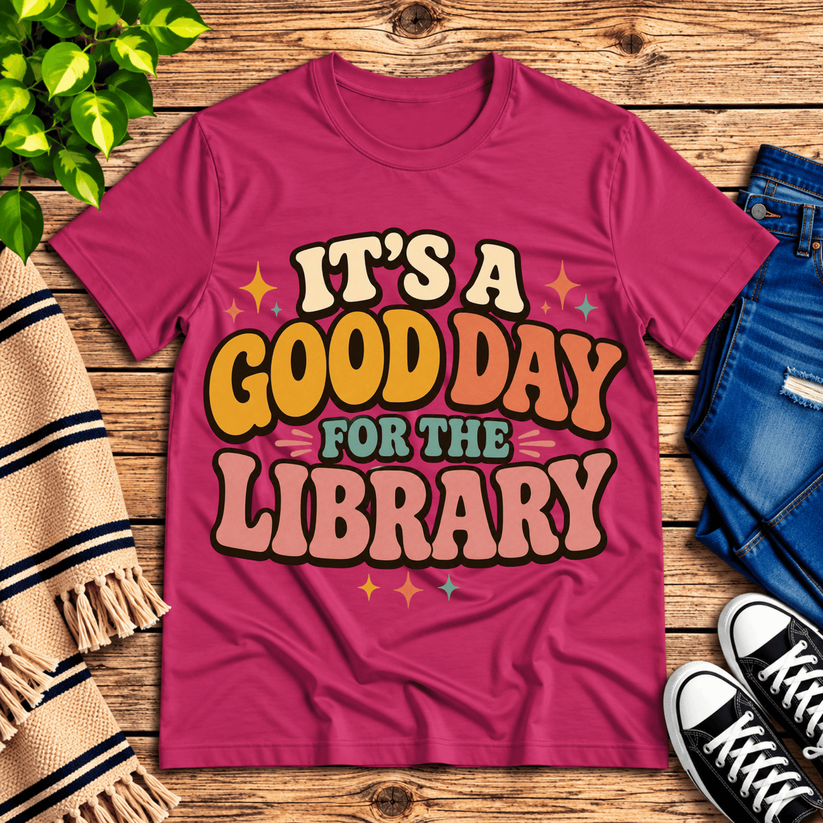 It's A Good Day book lovers graphic t-shirt cozy flat lay in berry.