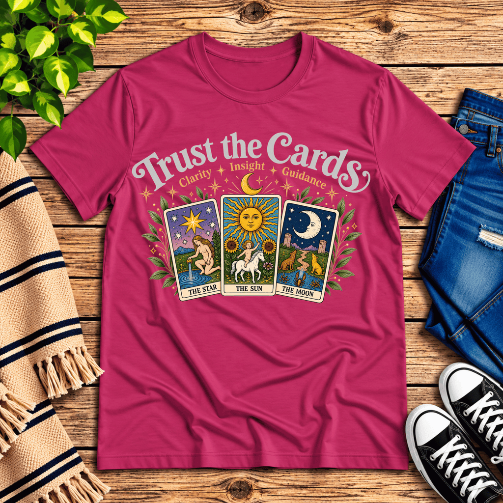 Trust the Cards mystical tarot graphic t-shirt cozy flat lay in berry.