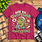 Overthink Frog cute animal graphic t-shirt cozy flat lay in berry.