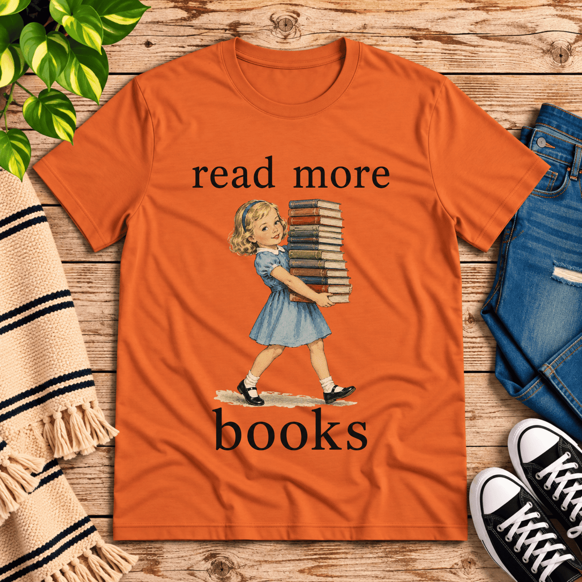 Read More vintage book graphic t-shirt cozy flat lay in burnt orange.