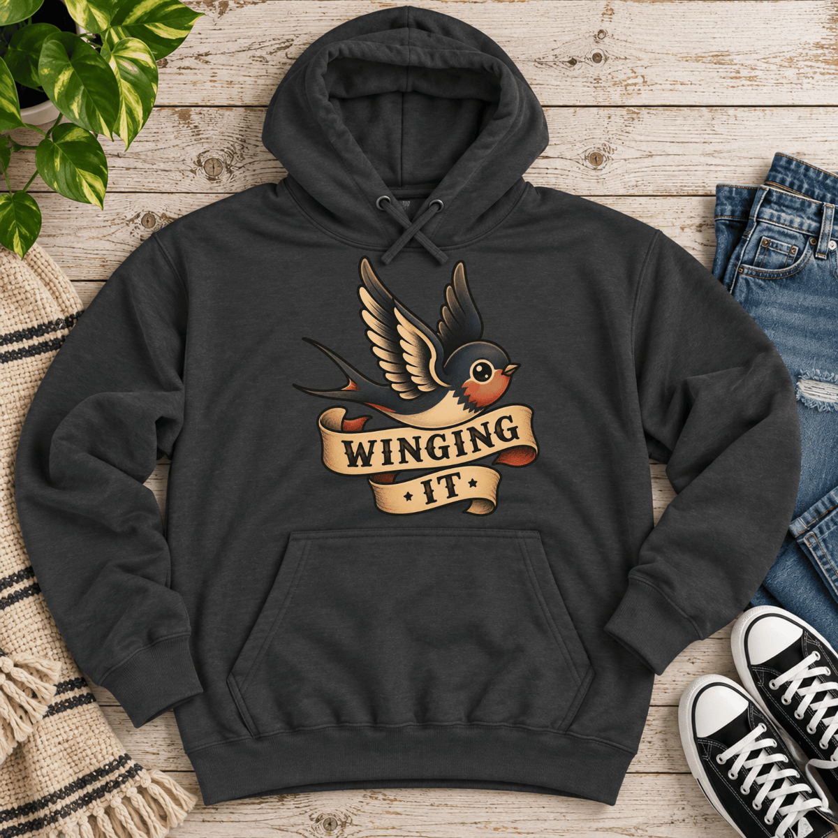 Winging It cute animal graphic hoodie cozy flat lay in charcoal heather.