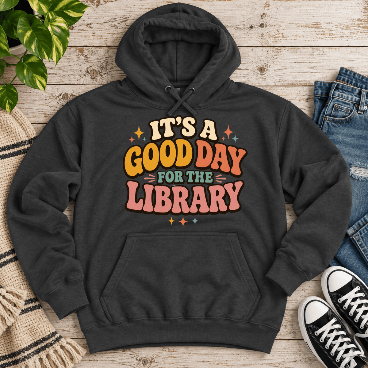 It's A Good Day cute book graphic hoodie cozy flat lay in charcoal heather.