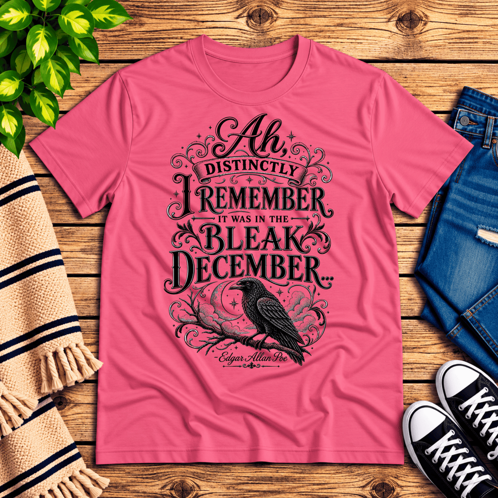 Bleak December book quote graphic t-shirt cozy flat lay in charity pink.
