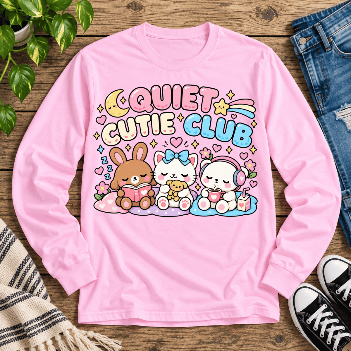 Quiet Cutie Club introvert graphic long sleeve cozy flat lay in classic pink.