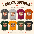 A color chart showing all the color options for Hot Cocoa Club graphic t-shirt.