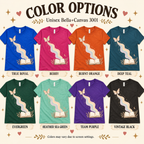 A chart showing all the colors Rainbow Book whimsical book graphic t-shirt comes in.
