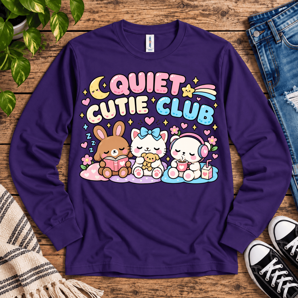 Quiet Cutie Club introvert graphic long sleeve cozy flat lay in deep purple.