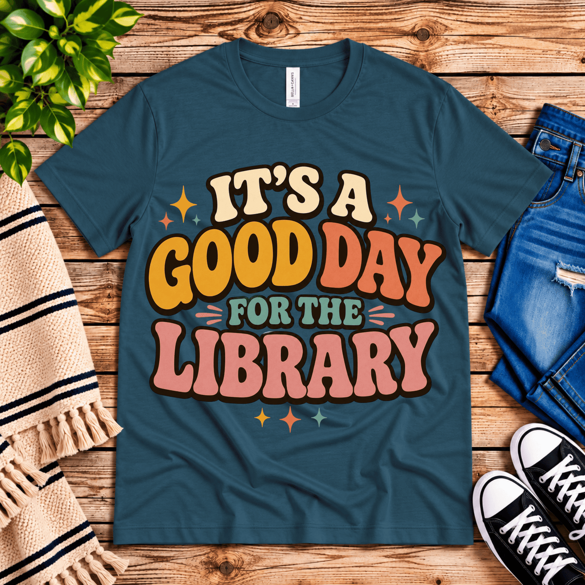 It's A Good Day book lovers graphic t-shirt cozy flat lay in deep teal.