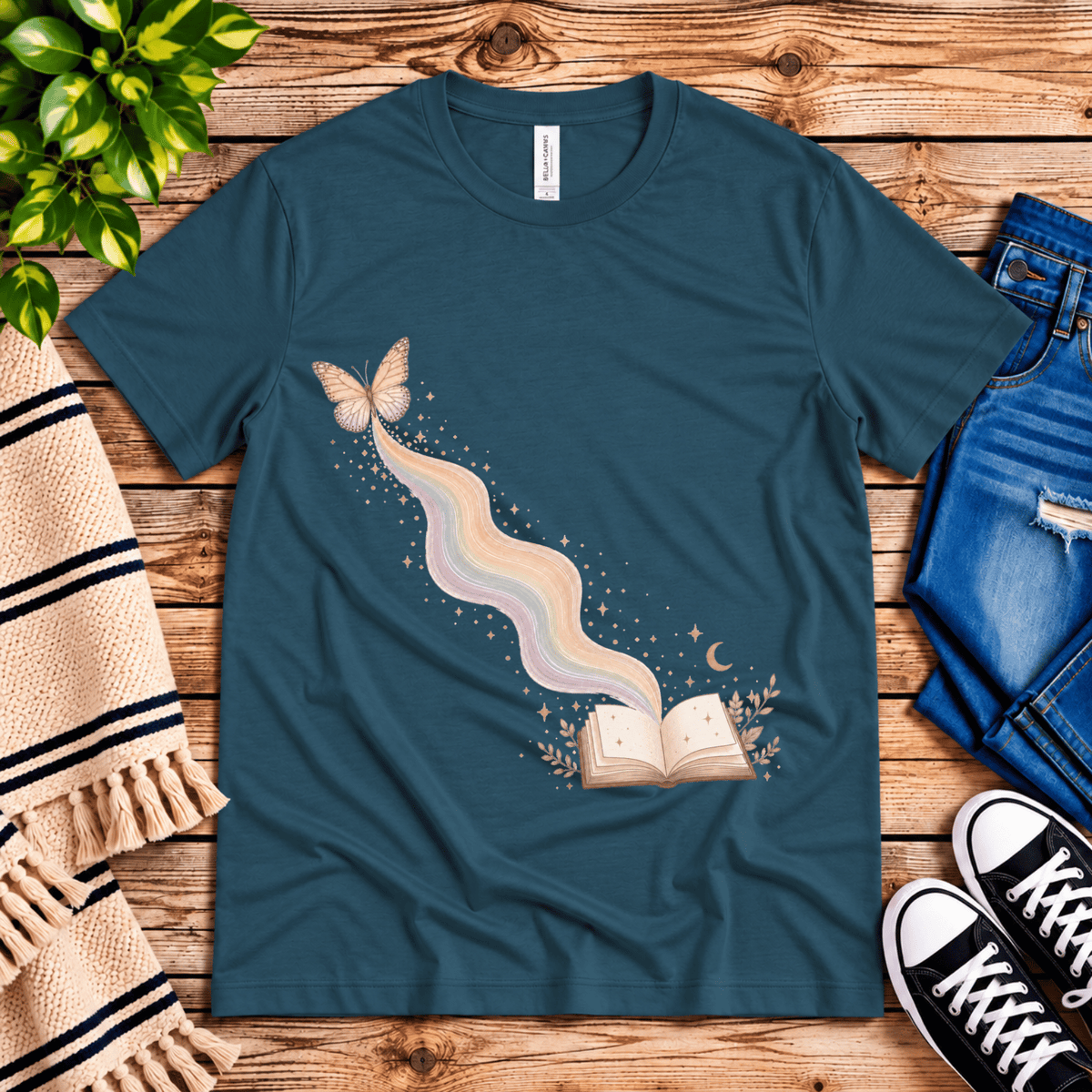 Rainbow Book whimsical book graphic t-shirt cozy flat lay in deep teal.