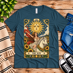 The Sun tarot card mystical graphic t-shirt cozy flat lay in deep teal.