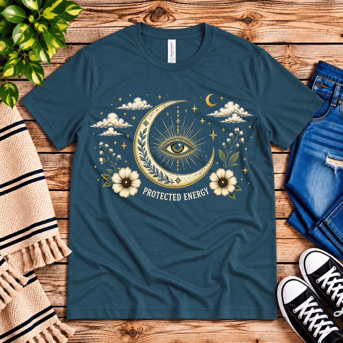 Protected Energy celestial mystic graphic t-shirt cozy flat lay in deep teal.